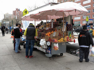 New York Street Vendor New York, USA - April 29, 2014: Food stand on a Manhattan street. There are more than 10,000 street vendors in NYC.